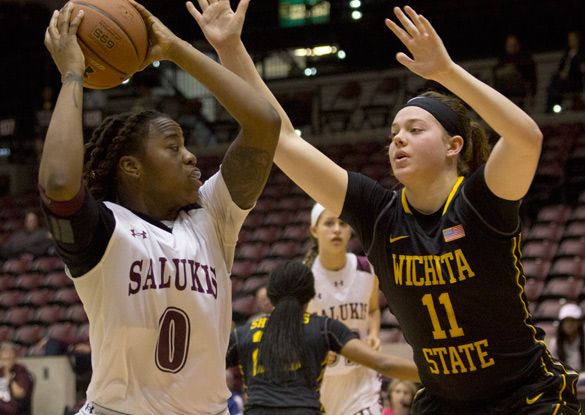Saluki forward/center Dyana Pierre attempts a basket during SIU'S 80-66 win against Wichita State on March 11 at SIU Arena. (DailyEgyptian.com file photo)