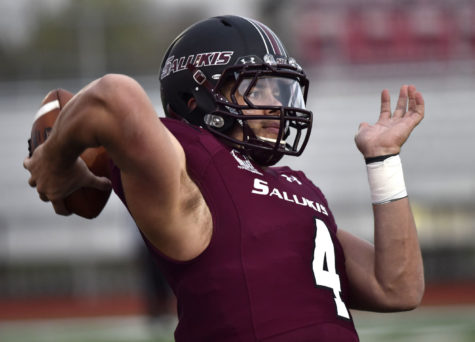 Sophomore quarterback Sam Straub practices his throw April 1 during Saluki Football's first-ever scrimmage at DuQuoin High School. (DailyEgyptian.com file photo)