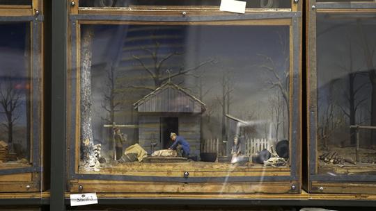 A hog-butchering in pioneer times in southern Illinois is depicted in a diorama by veteran Frederic Arnold Holder, Thursday, Aug. 25, 2016 in the University Museum’s archives warehouse. Holder, a Carbondale native, worked on dioramas during the Works Progress Administration Museum Project until he left for World War II in 1941. (Andy Phillippe | @andyphillippede)
