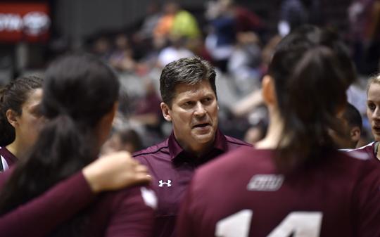 Assistant coach Todd Nelson addresses his team in a time out Saturday, Sept. 3, 2016, during SIU's 3-0 win against Western Michigan at SIU Arena. (Athena Chrysanthou | @Chrysant1Athena)