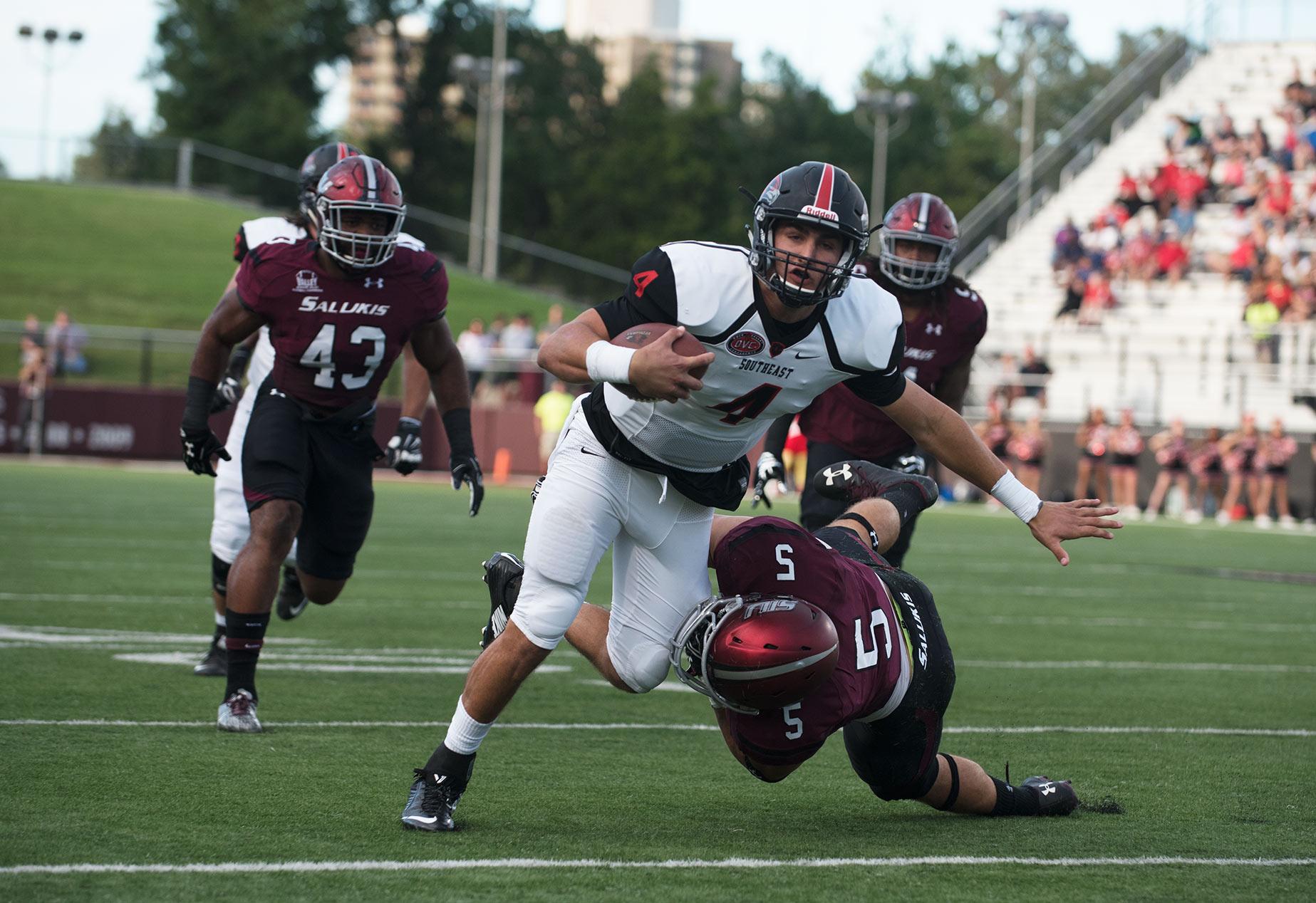 Saluki senior linebacker Chase Allen tackles SEMO junior quarterback Jesse Hosket during the first half of the Salukis' matchup against the Redhawks on Saturday, Sept. 10, 2016, at Saluki Stadium. (Jacob Wiegand | @JacobWiegand_DE)