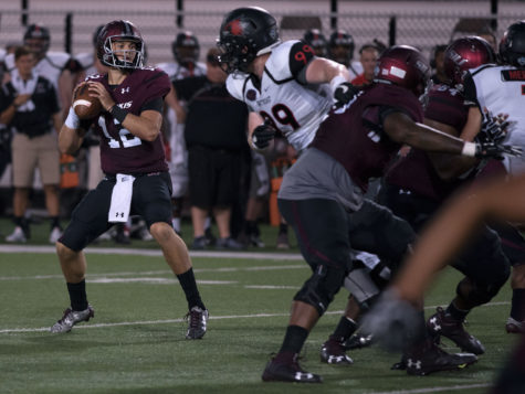 Senior quarterback Josh Straughan prepares to throw the ball during the first half of SIU's 30-22 win against the Redhawks on Saturday, Sept. 10, 2016, at Saluki Stadium. (Jacob Wiegand | @JacobWiegand_DE)