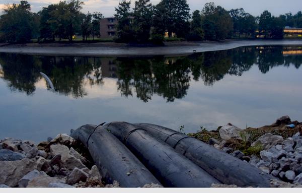 Pipes used to drain Campus Lake are seen Thursday, Sept. 15, 2016, near Thompson Point. (Autumn Suyko |@AutumnSuyko_DE)