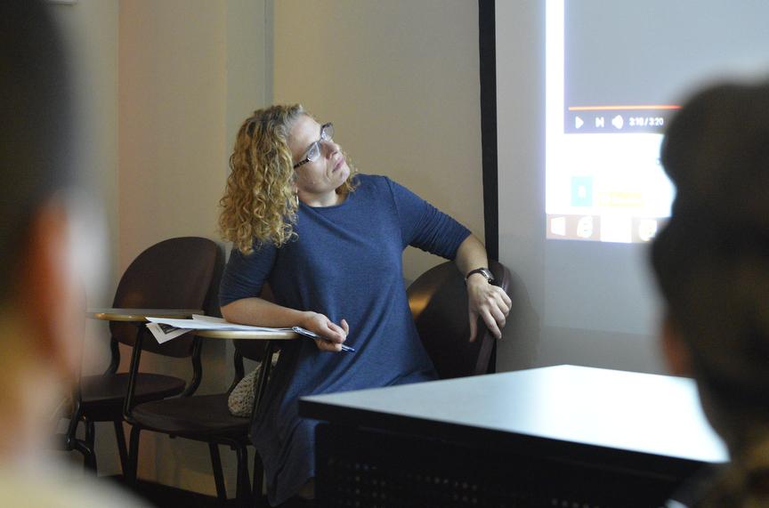 Associate Professor of Spanish Jennifer Smith, of Carbondale, watches a student presentation Tuesday, Oct. 4, 2016, during her Neoclassicism and Romanticism class in Faner Hall. (Autumn Douglas | @autumn__douglas)