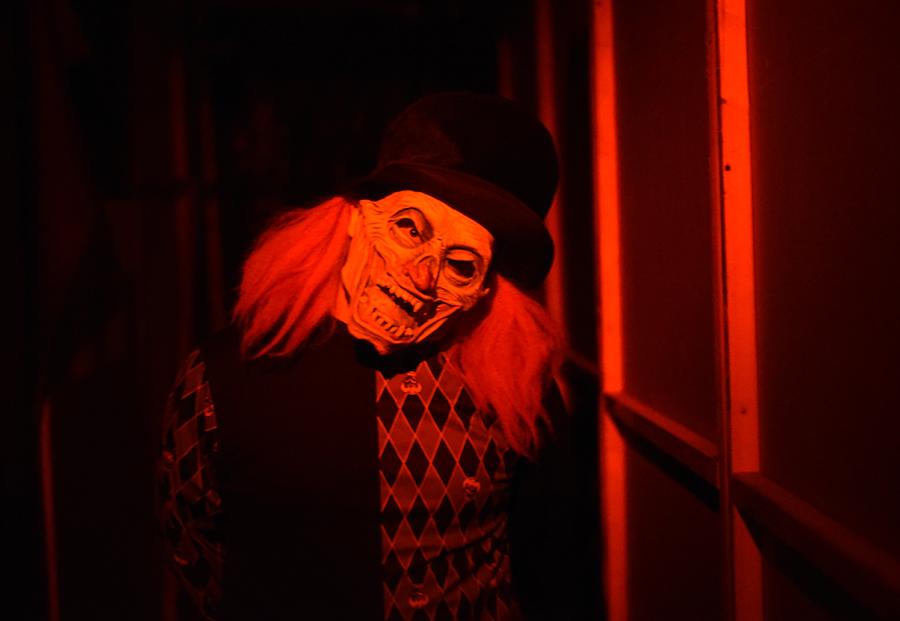 Dalton Gwodzik, of West Frankfort, poses while playing "Mr. Giggles" on Saturday, Oct. 22, 2016, at Chittyville School Haunted House in Herrin. Gwodzik has been working at Chittyville School Haunted House for two years and has worked in haunted houses for six years. (Morgan Timms | @Morgan_Timms)