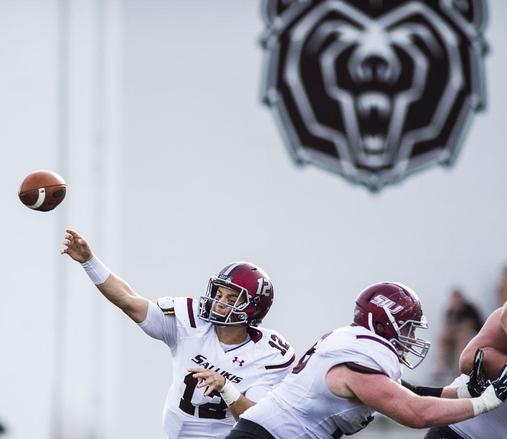 Senior quarterback Josh Straughan (12) launches a pass during the Salukis' 38-35 loss to the Missouri State Bears on Saturday, Oct. 29, 2016, in Springfield, Mo. (Ryan Michalesko | @photosbylesko)