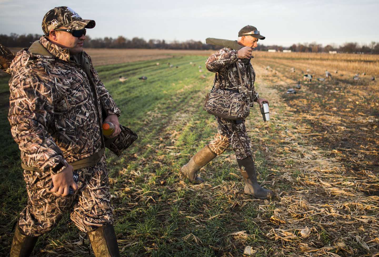 Grassy Lake Hunting Club guide Duane Smith, right, and John Thomas, of Nashville, Tenn., make their way to a hunting blind Wednesday, Nov. 30, 2016, during a Wounded Warriors duck hunt in Jonesboro. (Ryan Michalesko | @photosbylesko)