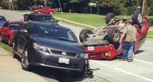 Murphysboro man flips car in Poplar Street accident