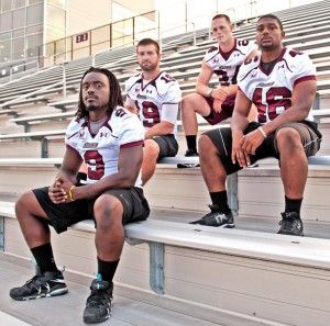 SIU football captains pose for a photograph during the 2013 Fan Fest. (DailyEgyptian.com file photo)