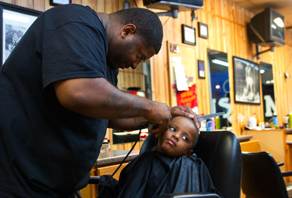Family bonds at barber shop