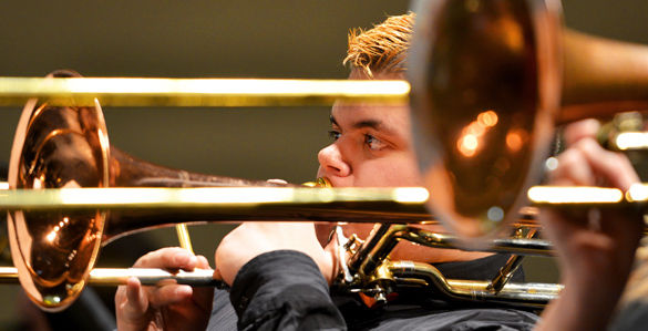 Ashton Corcoran, of DeSoto, Mo., performs with the DeSoto High School jazz band Saturday at Shryock Auditorium during the SIU Jazz Festival. The event brought together more than a dozen high school ensembles to highlight performances, host master classes and provide technique clinics for the students.JENNIFER GONZALEZ • DAILY EGYPTIAN