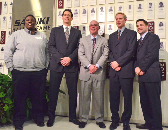 From left to right: Brittany Riley, Mark Gagliano, Jerry Kill, Mickey Maule and Joe Schley were inducted into the Saluki Hall of Fame on Jan. 31, 2014, at SIU Arena. (DailyEgyptian.com file photo)