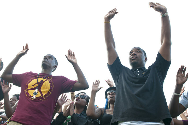 Lewis Marien • Daily Egyptian Desmon Walker, left, a junior from Champaign studying business management and president of the Alpha Phi Alpha SIU student chapter, and JaPone Johnson, a senior from Chicago studying criminal justice participate in the Hands Up, Dont Shoot Rally Monday in front of Grinnell Hall. Alpha Phi Alpha and Alpha Kappa Alpha organized the rally that featured guest speakers talking about the recent violence in Ferguson, Mo. We wanted this event to be peaceful and basically shed light on what happened and not necessarily the senseless things following after the rioting, Walker said.