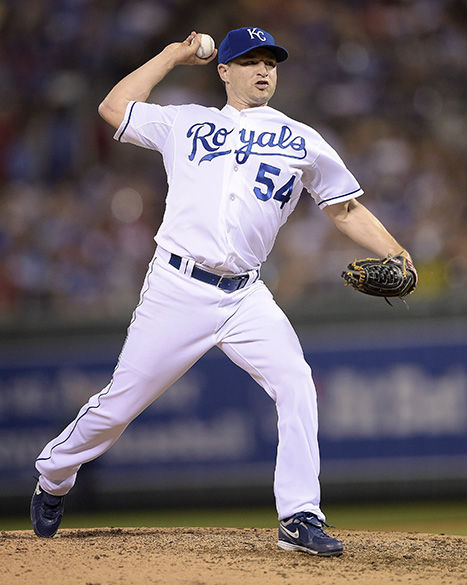 Kansas City Royals relief pitcher Jason Frasor throws in the seventh inning against the Cleveland Indians on Friday, July 25, 2014, at Kauffman Stadium in Kansas City, Mo. The Royals won, 6-4. John Sleezer • Kansas City Star