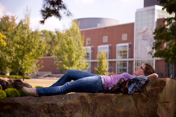 Evan Fait • Daily Egyptian Allison Kerness, a freshman from St. Anne studying radiological sciences, naps between classes Wednesday outside Morris Library. I come out here every Monday, Wednesday and Friday, Kerness said. I do homework sometimes, sometimes I sleep.