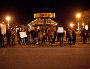 Protestors line up at the corner of West Main Street and North Illinois Avenue Monday night in Carbondale after police officer Darren Wilson was not indicted in Ferguson, Mo. The protestors were chanting No Justice, No Peace and other terms. -Lewis Marien
