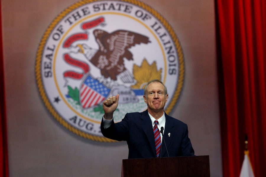 Gov. Bruce Rauner gives a thumbs up after giving his first speech as governor on Jan. 12, 2015 at the Prairie Capital Convention Center in Springfield. (Nancy Stone/Chicago Tribune/TNS)