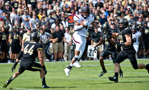 Then-SIU senior tight end MyCole Pruitt catches the ball for a first down Sept. 20, 2014, during the first half of the Salukis’ 35-13 loss against Purdue University at Ross-Ade Field in West Lafayette, Ind. (DailyEgyptian.com file photo)