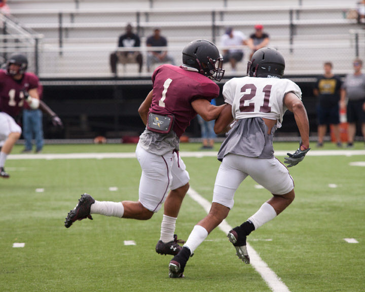 Then-sophomore cornerback Ryan Neal, right, runs on a play. Neal played safety his freshman season. 