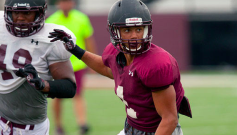 Senior wide receiver Israel Lamprakes runs a route during a scrimmage in Septmeber at Saluki Stadium. (DailyEgyptian.com file photo)