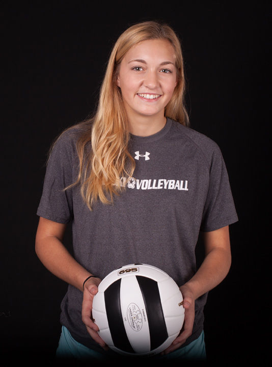 Saluki freshman defensive specialist Tara Routliffe poses with a volleyball. (Daily Egyptian file photo)
