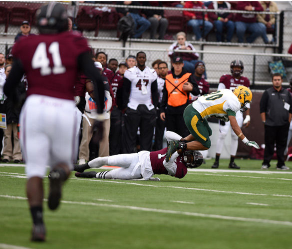 Former safety Anthony Thompson tackles an opposing player during SIU's 35-29 loss to North Dakota State University on Oct. 31, 2015, at Saluki Stadium. (DailyEgyptian.com file photo)