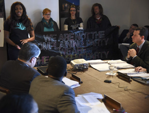 Tierra Carpenter, a sophomore from Lansing studying TV and Digital Media Radio, addresses the SIU Board of Trustees on Dec. 9, 2015, at the Stone Center. Carpenter and about 50 others walked from the Communications Building to the Stone Center as part of a sexual assault awareness walk. The group, known as The Consent Party, asked the board to reconsider multiple cases they believed were mishandled and its sexual assault policies. 