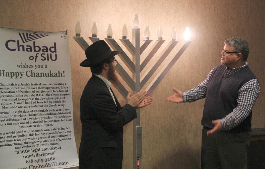 Jewish community brings first night of Hanukkah to light