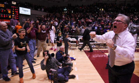 Saluki coach Barry Hinson celebrates with fans after SIU's 81-78 win against Illinois State on Jan. 12 at SIU Arena. (Jacob Wiegand | @JacobWiegand_DE)