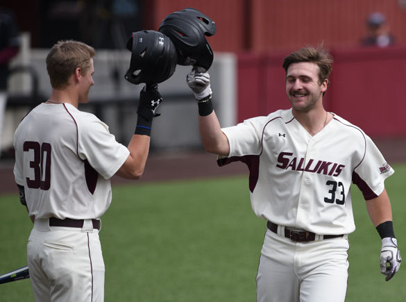 Then-sophomore infielder Hunter Anderson celebrates his home run with then-sophomore catcher Nick Hutchins in the second inning of SIU’s 2-2 tie with St. John’s on – March 13, 2016, at Itchy Jones Stadium. Anderson had one run, one hit and one RBI in the game. 