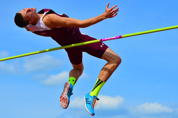 Junior jumper Kyle Landon clears the bar during the high jump on Saturday at the Bill Cornell Spring Classic. Landon won the event with a height of 2.20 meters. – March 26, 2016, Carbondale, Ill.
