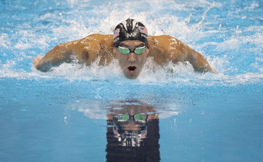 U.S. swimmer Michael Phelps swims to a gold medal in the mens 200m Butterfly at the Olympic Aquatic Stadium in Rio de Janeiro, Brazil, on Tuesday, Aug. 9, 2016. (Mark Reis/Colorado Springs Gazette/TNS)