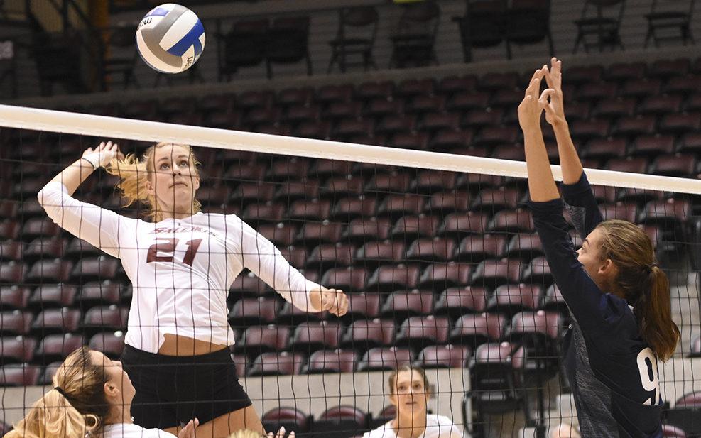 Junior middle hitter Alex Rosignol goes for a kill Saturday, Sept. 3, 2016, during SIU’s 3-1 loss to Northern Arizona at SIU Arena. (Sean Carley | @SCarleyDE)