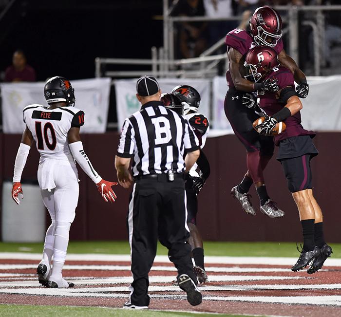 Sophomore wide receiver Darrell James and junior wide receiver Connor Iwema celebrate a touchdown in the third quarter of SIU's 30-22 win against Southeast Missouri on Saturday, Sept. 10, 2016, at Saluki Stadium. (Morgan Timms | @Morgan_Timms)