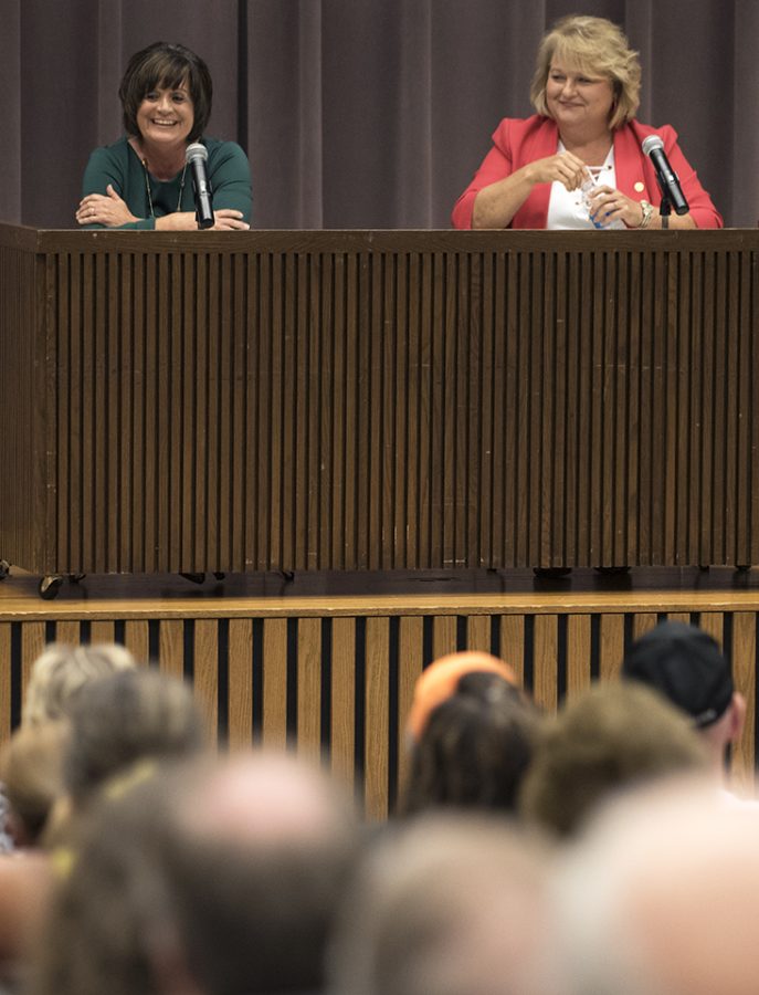 Democratic challenger Marsha Griffin, of Jonesboro, left, and Republican Rep. Terri Bryant, of Murphysboro, react to applause after their closing statements Thursday, Sept. 22, 2016, during a candidate forum hosted by the State Universities Annuitants Association in the Lesar Law Building Auditorium. (Morgan Timms | @Morgan_Timms)