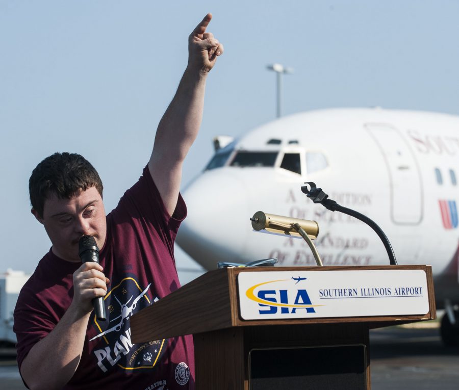 John Henley, of Marion, speaks to a crowd before the 2016 Plane Pull at Southern Illinois Airport in Murphysboro. Henley was designated as this years face of Special Olympics Illinois. (Ryan Michalesko | @photosbylesko)