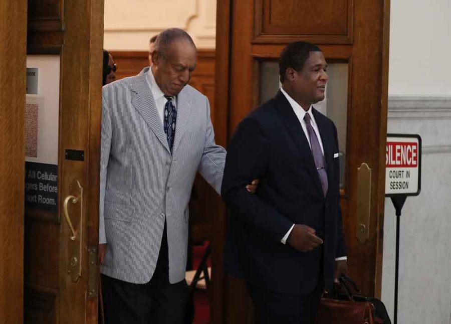 Bill Cosby, left, is lead out of Courtroom A on the Montgomery County Courthouse after the pre-trial conference on Sept. 6, 2016 in Norristown, Pa. The court date was set to be no later than June 5, 2017. (Michael Bryant/Philadelphia Inquirer/TNS)