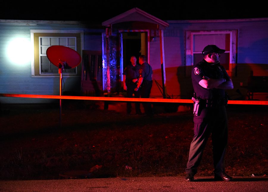 Police investigate the scene where a male was shot Saturday, Oct. 22, 2016, in the 400 block of East Ashley Street in Carbondale. (Morgan Timms | @Morgan_Timms)