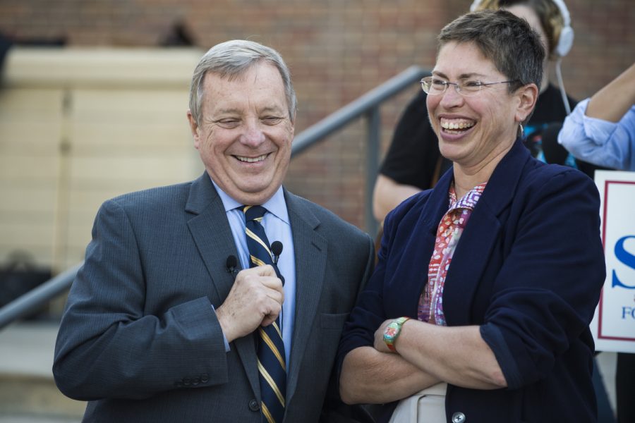 U.S. Sen. Dick Durbin, left, and State Senate candidate Shelia Simon laugh during a Simon campaign stop at Morris Library in Carbondale. (Ryan Michalesko | @photosbylesko)