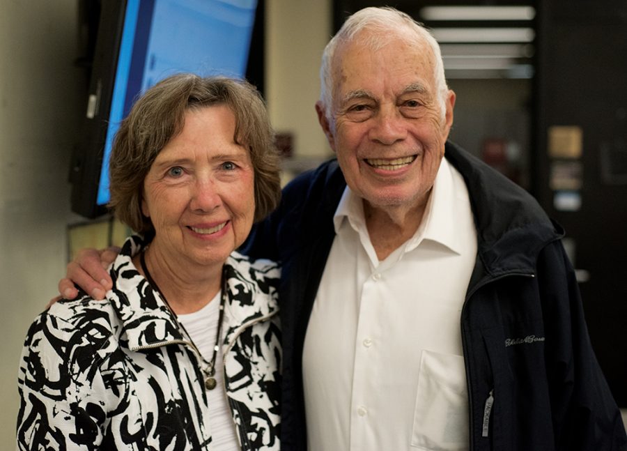 Former Editor-in-Chief Bill Hollada and his wife, Roberta Hollada, pose Friday, Oct. 21, 2016, during a newsroom tour in celebration of the Daily Egyptians 100-year anniversary. (Morgan Timms | @Morgan_Timms)