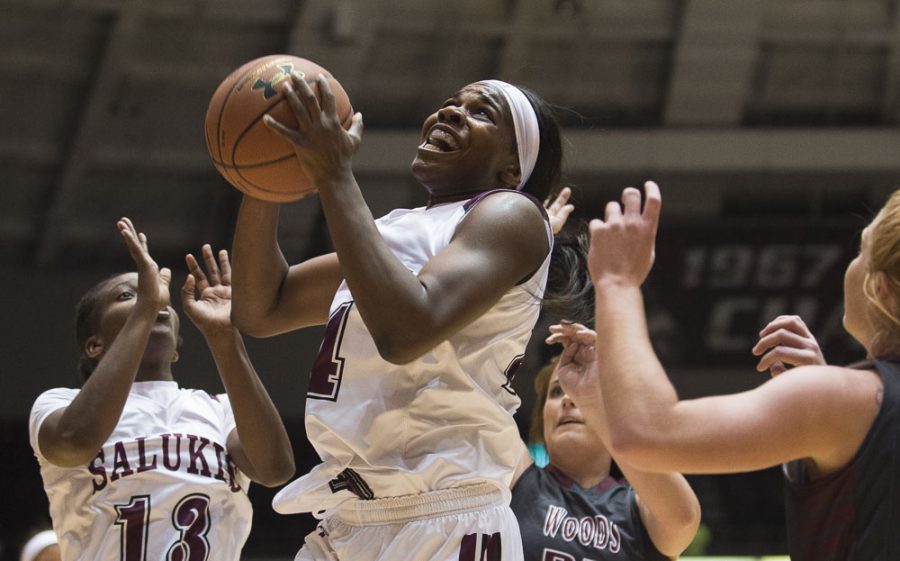 SIU senior forward Kim Nebo (24) puts up a shot during the Salukis 78-58 win over the William Woods Owls on Thursday, Oct. 27, 2016, at the SIU Arena. (Ryan Michalesko | @photosbylesko)