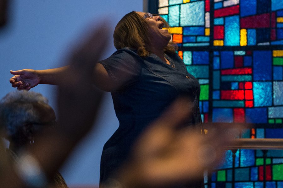 Tammie Swinney, of Carbondale, participates in a worship service Sunday, Oct. 30, 2016, at Olivet Free Will Baptist Church in Carbondale. “It’s like a family [at Olivet],” she said. Swinney has been attending Olivet for five and a half years. This year the church celebrates 150 years in the Carbondale community. (Jacob Wiegand | @jawiegandphoto)