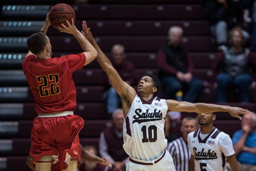 Saluki freshman guard Aaron Cook tries to block UMSL junior guard Steven Davis during SIUs 72-67 exhibition victory on Thursday, Nov. 3, 2016, at SIU Arena. Cook and Davis scored six and five points respectively in the game. (Jacob Wiegand | @JacobWiegand_DE) 