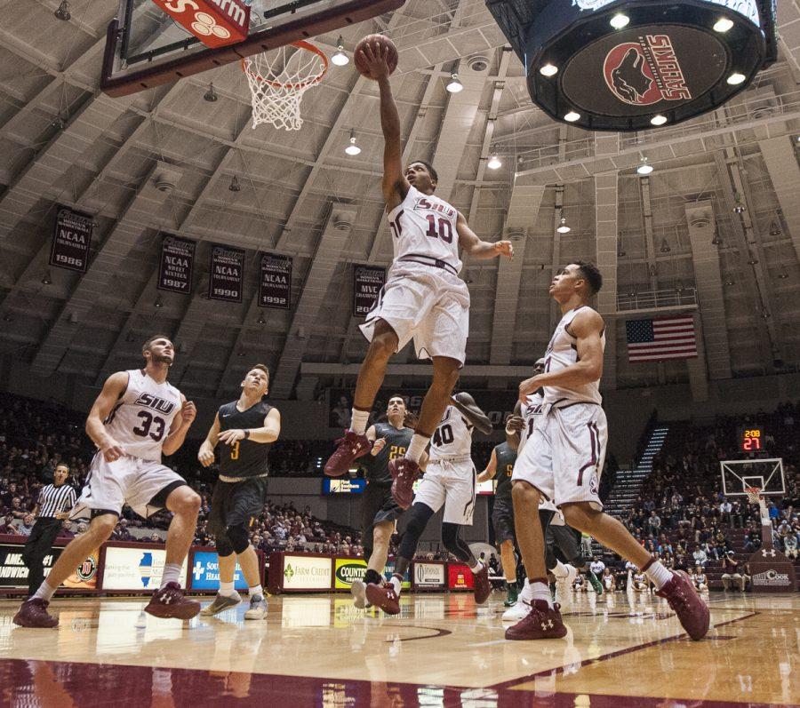 Freshman guard Aaron Cook (10) lays up a shot Wednesday, Nov. 16, 2016, during the Salukis 85-64 win over the Missouri Southern Lions at SIU Arena. (Ryan Michalesko | @photosbylesko)
