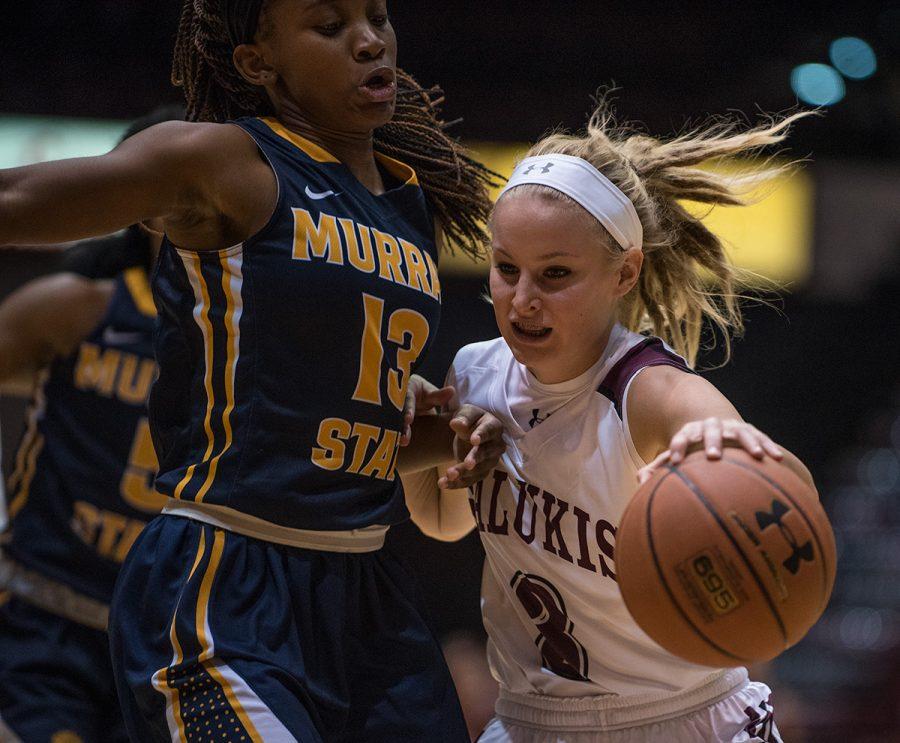 SIU sophomore guard Olivia Bowling goes toward the goal while being guarded by Racer junior guard/forward Bria Bethea during the Salukis 70-63 win against Murray State on Thursday, Nov. 17, 2016, at SIU Arena. (Jacob Wiegand | @jawiegandphoto)