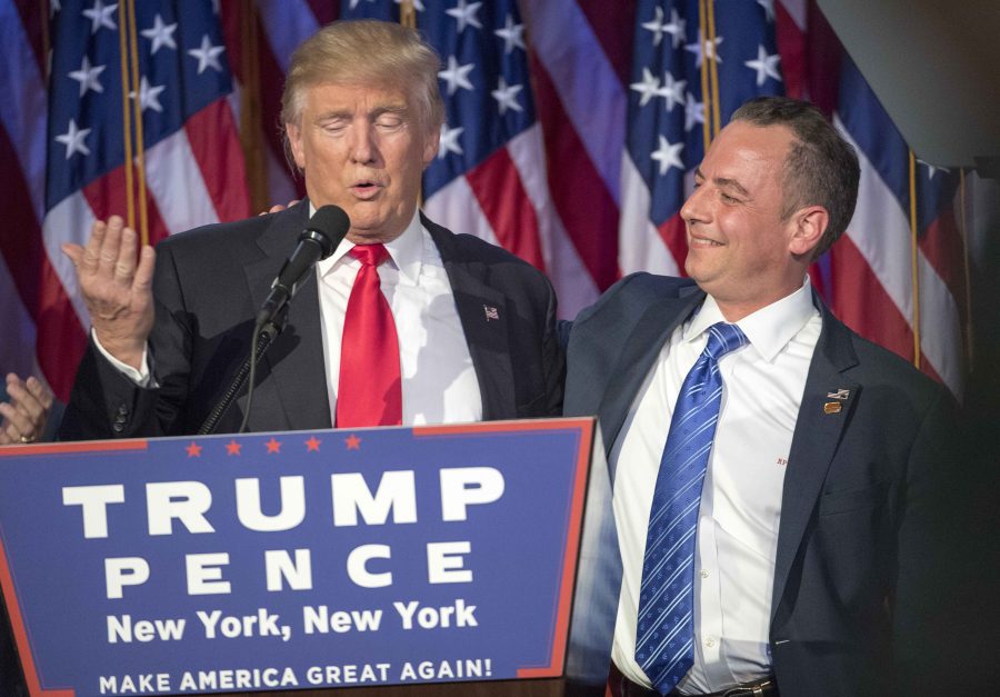 President-elect Donald Trump acknowledges the chairman of the RNC, Reince Priebus, while talking to supporters at the Election Night Party at the Hilton Midtown Hotel in New York City on Wednesday, Nov. 9, 2016. (J. Conrad Williams Jr./Newsday/TNS)