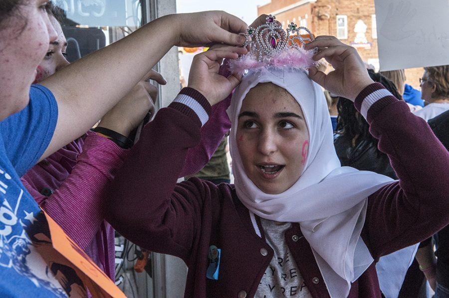 Carbondale High School student Bushrah Abughazaleh repositions her tiara Saturday, Jan. 21, 2017, during the Southern Illinois Womens March by the Carbondale Civic Center. (Morgan Timms | @Morgan_Timms)