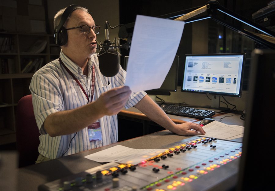 WSIU Radio reporter Kevin Boucher, of Murphysboro, reads local and state news headlines Monday, Jan. 23, 2017, during the daily newscast for WSIU in the radio studio of the Communications Building. An SIU alumnus, Boucher has been around SIUs radio department since 1976. When a student graduates from SIU Carbondale with a bachelors in radio-television, they can put on their resume the real-world experience that they have worked with a nationally-recognized NPR station, Boucher said. Really these things you cannot learn by sitting in a classroom. (Morgan Timms | @morgan_timms) 