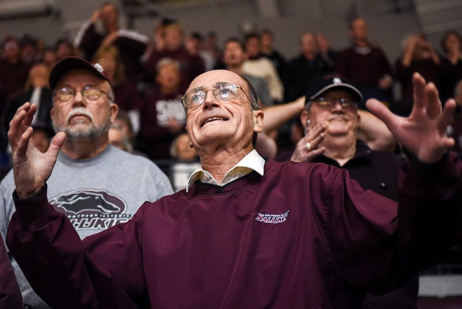 Long time Saluki basketball and football fan Tilden Parks, of Marion, reacts in exasperation to a point lost to Missouri State on Saturday, Jan. 28, 2017, during the Salukis 85-84 win against the Bears at SIU Arena. The game marked Parks 533rd consecutive SIU mens home basketball game. (Morgan Timms | @Morgan_Timms)