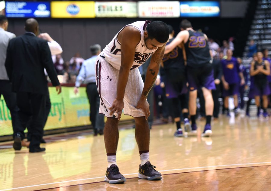 Senior guard Mike Rodriguez leans over after SIUs 58-57 loss against the Northern Iowa Panthers on Saturday, Jan. 21, 2017, at SIU Arena. (Luke Nozicka | @lukenozicka)